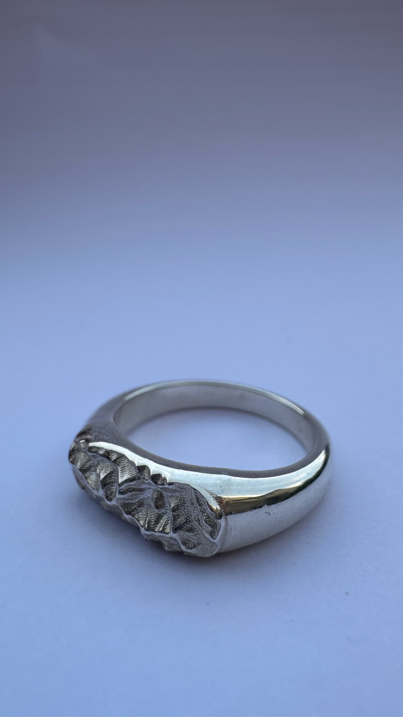 Bespoke topographic map ring inspired by real terrain contours