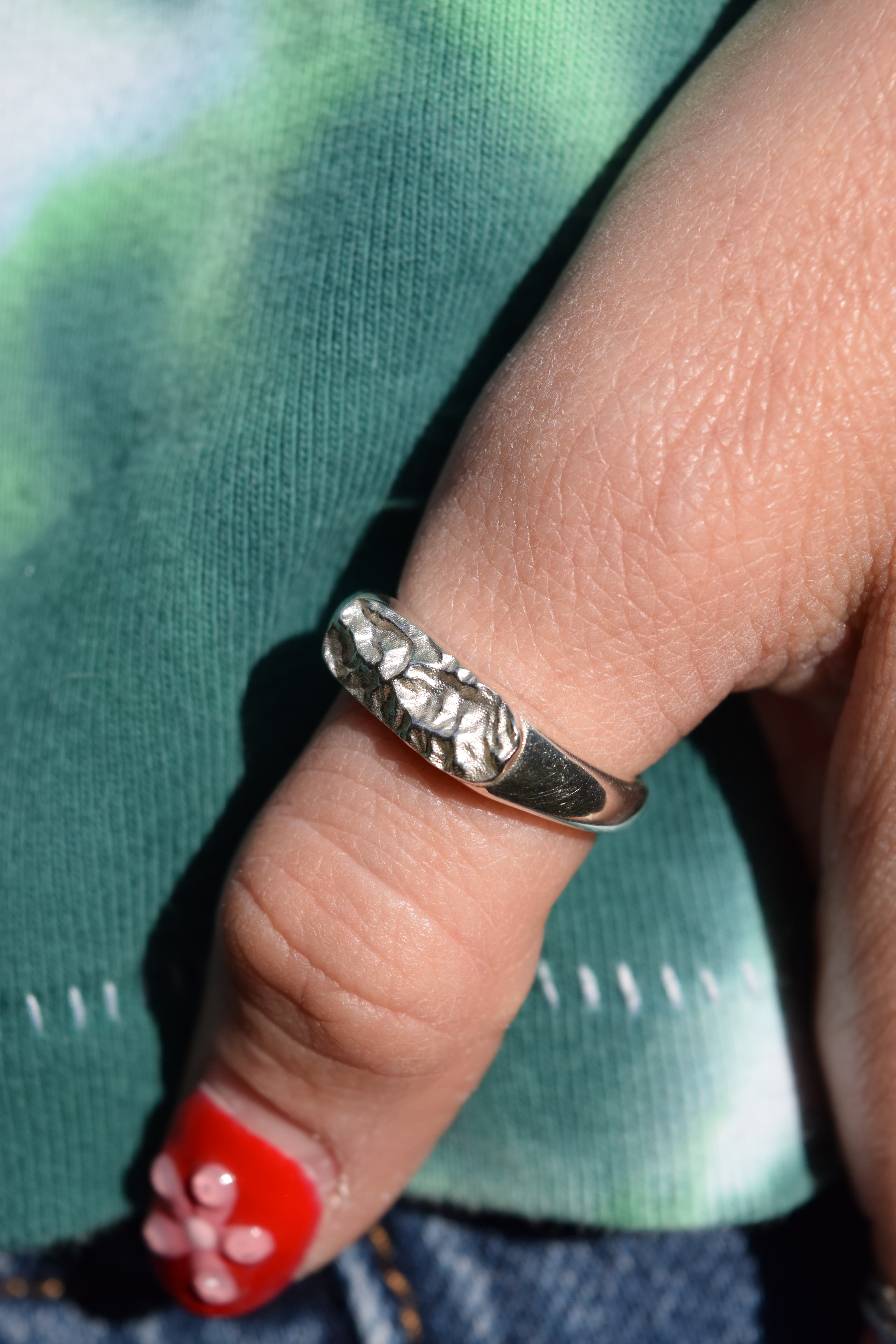 Bespoke engraved map ring with detailed contour lines from WILDRING