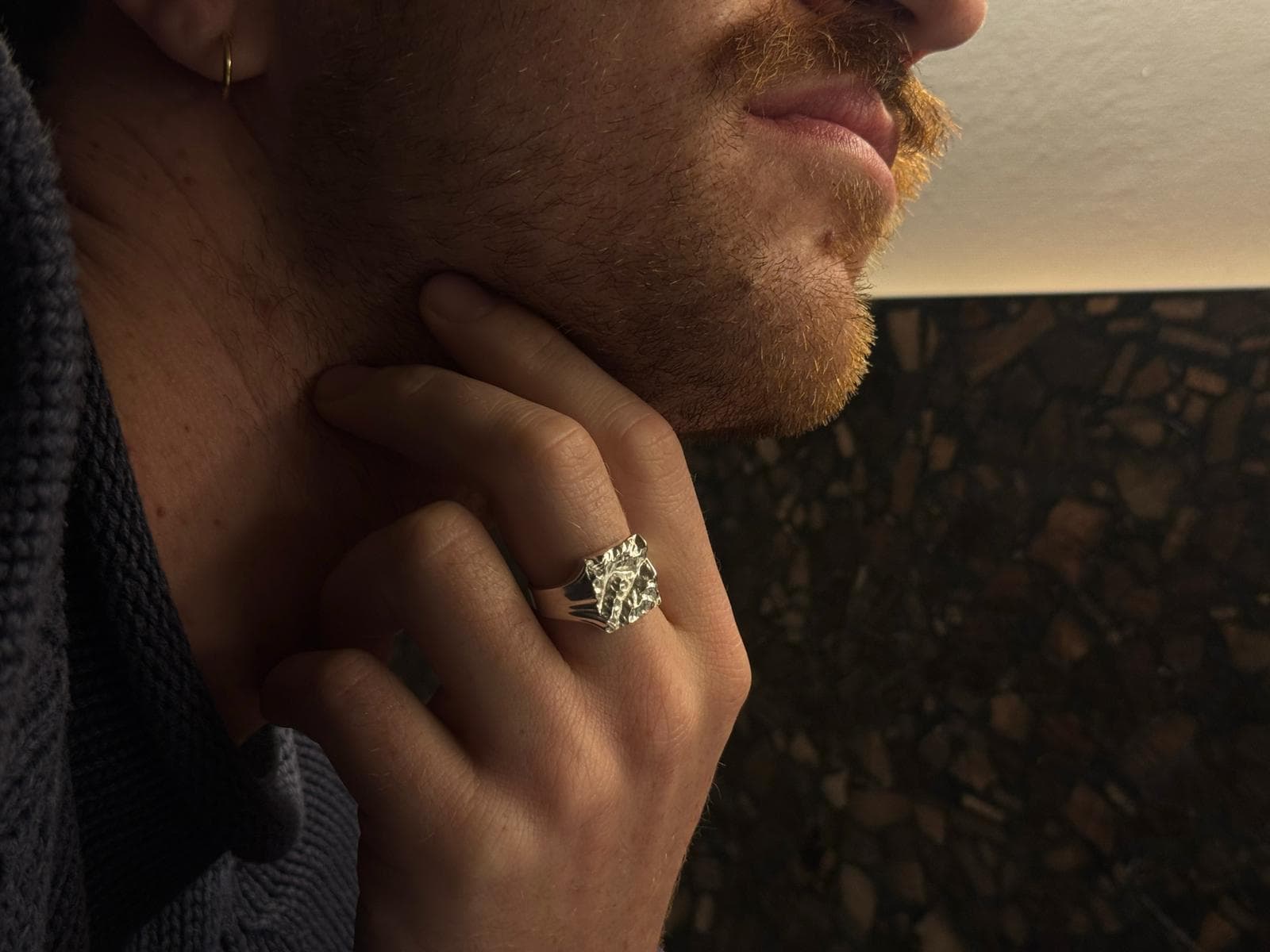 Customer wearing bespoke WILDRING custom map ring based on real location