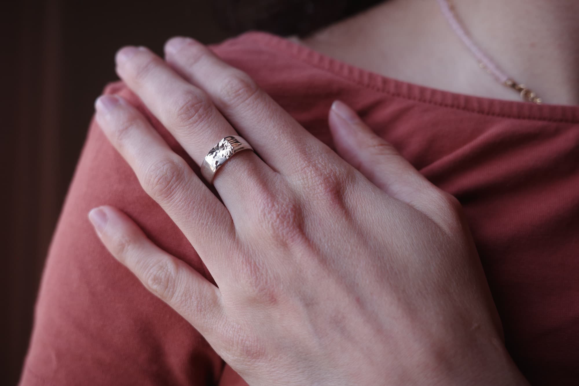 Claudia wearing a bespoke WILDRING custom map ring