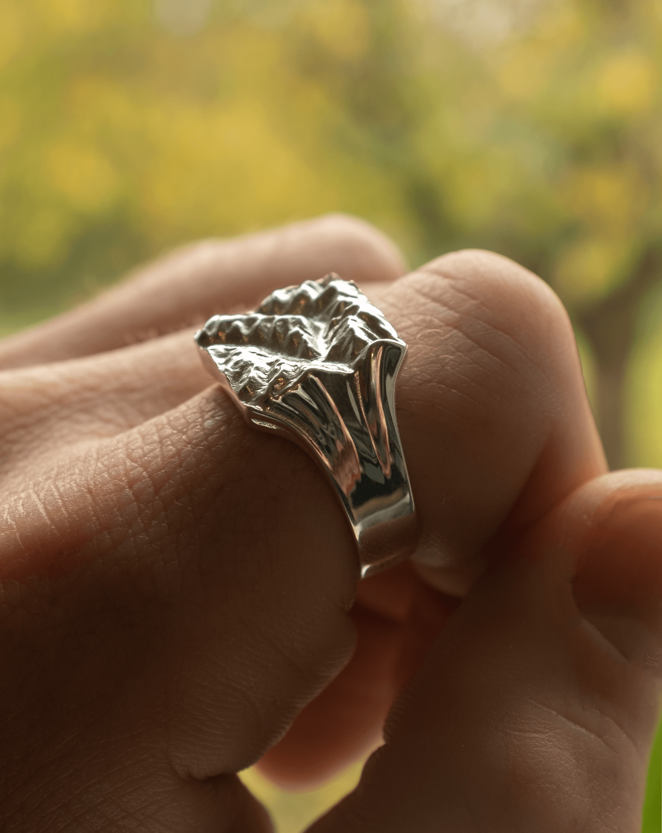 Custom map ring commission showing personalised terrain lines